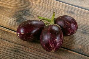 Raw smal asian baby eggplant photo