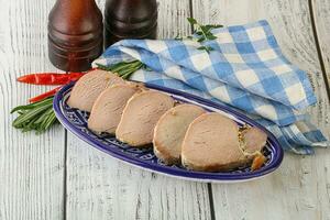 Baked pork tenderloin served rosemary photo