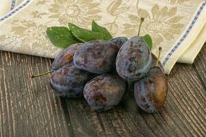 Ripe sweet tasty blue plum photo