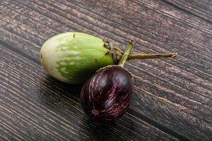 Heap of raw asian baby eggplant photo