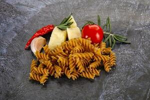 Raw whole grain pasta fusilli photo