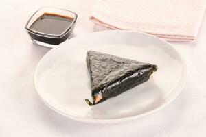 Japanese traditional onigiri with fish photo