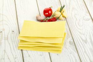 Uncooked raw Lasagna dry sheets photo