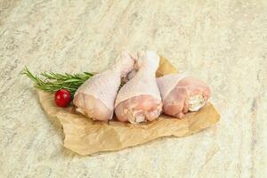 Raw chicken leg Drumstick for cooking photo