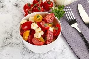 Italian Caprese salad with tomato and mozzarella photo