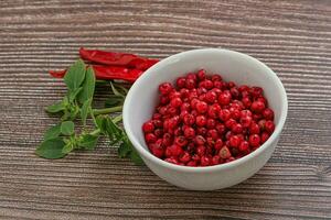 Red pepper seeds in the bowl photo