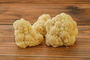 Raw white cauliflower cabbage heap photo