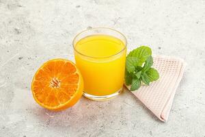 Fresh orange juice served mint photo