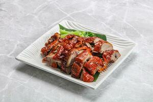 Asian cuisine - roasted duck with skin photo