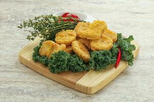 Crispy chicken nuggets with tomato ketchup photo