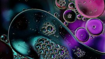 Abstract Colorful Food Oil Drops Bubbles and spheres Flowing on Water Surface photo