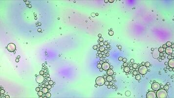 Abstract Colorful Food Oil Drops Bubbles and spheres Flowing on Water Surface photo