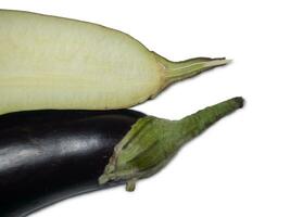 Eggplant cut in half on a white background. Useful vegetable. Harvest from the garden. Eggplant isolate. photo