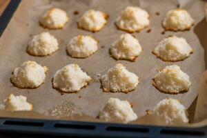 macaroon cookies on baking paper photo