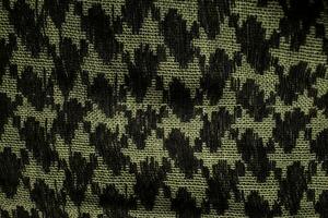 Keffieh scarf. The texture of the cotton traditional symbolic arabian scarf. Khaki back. photo