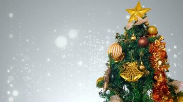 Christmas tree with decorations, copy space area, and silver elegant blur light background. photo