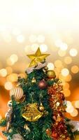 Portrait and Close up of christmas tree with decorations, copy space area, blur light background. photo