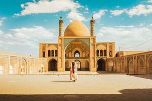 Kashan, Iran , 2022 - Tourists and pilgrims explore sightseeing beautiful Agha Bozorg Mosque photo