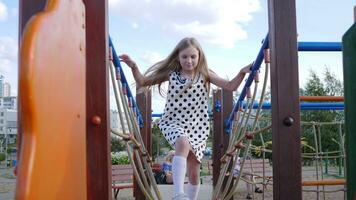 Little girl child happy playing in summer park photo