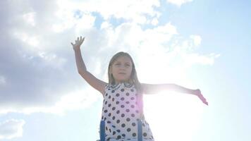 Little girl child happy playing in summer park photo