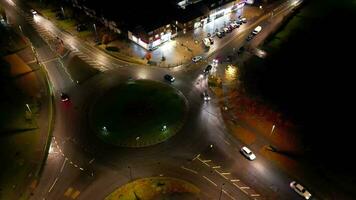 Aerial View of Illuminated Road and Traffic Roundabout at Barnfield College A6 East Luton City of England UK. The Footage Was Captured with Drone's Camera on November 11th, 2023 video