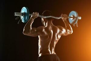 bodybuilder lifting a barbell on black background photo