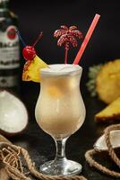 Rum based Pina Colada cocktail with pineapple juice and coconut milk photo