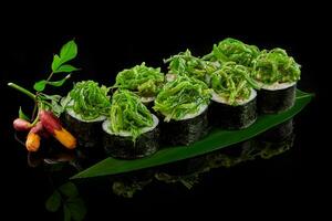 Vegetable makizushi rolls with wakame seaweed, asparagus, bell pepper photo