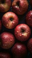 AI generated Close-up of red apples with water drops on dark background. Fruit wallpaper photo