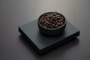 Roasted coffee beans on a black digital scale. photo