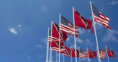 United States and Trinidad and Tobago Flags Waving Together in the Sky, Seamless Loop in Wind, Space on Left Side for Design or Information, 3D Rendering video