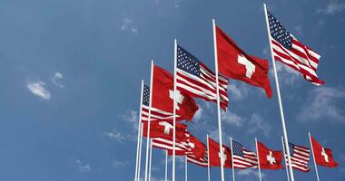 United States and Switzerland Flags Waving Together in the Sky, Seamless Loop in Wind, Space on Left Side for Design or Information, 3D Rendering video