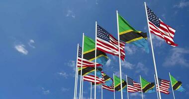 United States and Tanzania Flags Waving Together in the Sky, Seamless Loop in Wind, Space on Left Side for Design or Information, 3D Rendering video