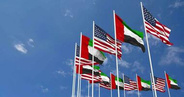 United States and United Arab Emirates Flags Waving Together in the Sky, Seamless Loop in Wind, Space on Left Side for Design or Information, 3D Rendering video