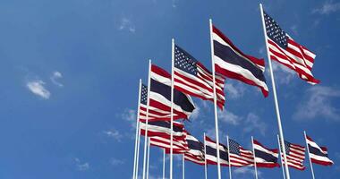 United States and Thailand Flags Waving Together in the Sky, Seamless Loop in Wind, Space on Left Side for Design or Information, 3D Rendering video