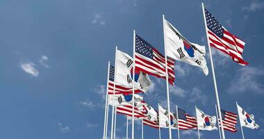 vereinigt Zustände und Süd Korea Flaggen winken zusammen im das Himmel, nahtlos Schleife im Wind, Raum auf links Seite zum Design oder Information, 3d Rendern video