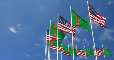 United States and Turkmenistan Flags Waving Together in the Sky, Seamless Loop in Wind, Space on Left Side for Design or Information, 3D Rendering video
