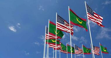 United States and Mauritania Flags Waving Together in the Sky, Seamless Loop in Wind, Space on Left Side for Design or Information, 3D Rendering video