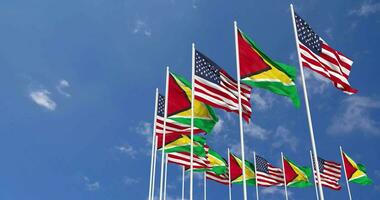 United States and Guyana Flags Waving Together in the Sky, Seamless Loop in Wind, Space on Left Side for Design or Information, 3D Rendering video