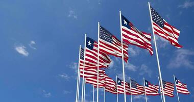 United States and Liberia Flags Waving Together in the Sky, Seamless Loop in Wind, Space on Left Side for Design or Information, 3D Rendering video