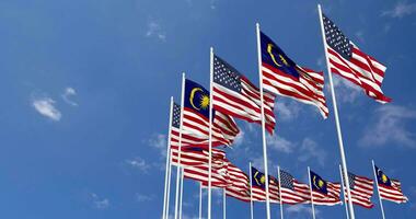 United States and Malaysia Flags Waving Together in the Sky, Seamless Loop in Wind, Space on Left Side for Design or Information, 3D Rendering video