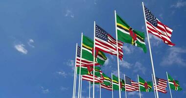 United States and Dominica Flags Waving Together in the Sky, Seamless Loop in Wind, Space on Left Side for Design or Information, 3D Rendering video