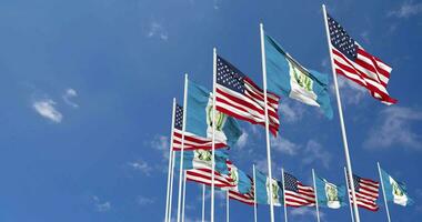 United States and Guatemala Flags Waving Together in the Sky, Seamless Loop in Wind, Space on Left Side for Design or Information, 3D Rendering video