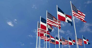 United States and Dominican Republic Flags Waving Together in the Sky, Seamless Loop in Wind, Space on Left Side for Design or Information, 3D Rendering video