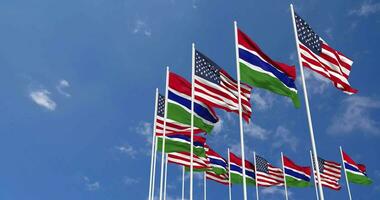 United States and Gambia Flags Waving Together in the Sky, Seamless Loop in Wind, Space on Left Side for Design or Information, 3D Rendering video