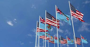 United States and Fiji Flags Waving Together in the Sky, Seamless Loop in Wind, Space on Left Side for Design or Information, 3D Rendering video