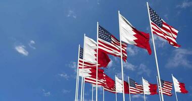 United States and Bahrain Flags Waving Together in the Sky, Seamless Loop in Wind, Space on Left Side for Design or Information, 3D Rendering video