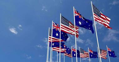 uni États et Australie drapeaux agitant ensemble dans le ciel, sans couture boucle dans vent, espace sur la gauche côté pour conception ou information, 3d le rendu video