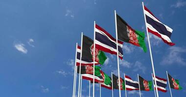 Afghanistan and Thailand Flags Waving Together in the Sky, Seamless Loop in Wind, Space on Left Side for Design or Information, 3D Rendering video