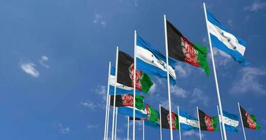 Afghanistan and Honduras Flags Waving Together in the Sky, Seamless Loop in Wind, Space on Left Side for Design or Information, 3D Rendering video